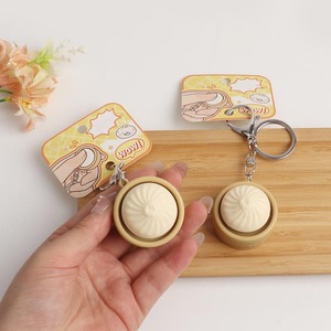 Wholesale Plastic Dumpling Press Button Colorful Seamed Bun Vending Decompression Keychain Capsule Toy - Product Image 3
