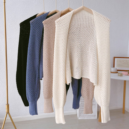 Женская трикотажная накидка-пончо