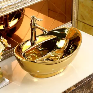 新しいエレガントなホテルの洗面所のバスルームのシンクセラミックゴールデンカウンタートップ洗面台
