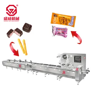 Shengwei Machinery full automatic multifunction tidying feeding candy bar corn puff oatmeal pastry packing machine