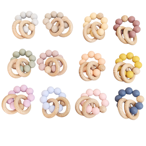 Jouet <span class=keywords><strong>de</strong></span> <span class=keywords><strong>dentition</strong></span> pour bébé, perles en silicone souple, bracelet <span class=keywords><strong>de</strong></span> <span class=keywords><strong>dentition</strong></span> sans BPA, <span class=keywords><strong>anneau</strong></span> <span class=keywords><strong>de</strong></span> <span class=keywords><strong>dentition</strong></span> rond en bois <span class=keywords><strong>de</strong></span> hêtre naturel pour nouveau-né - Product Image 1