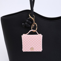 Nouveau style mini sac à main porte-clés en cuir PU, étui pour écouteurs, mini sac de rangement, pendentif pour sac à dos pour écouteurs Bluetooth, idéal pour un cadeau