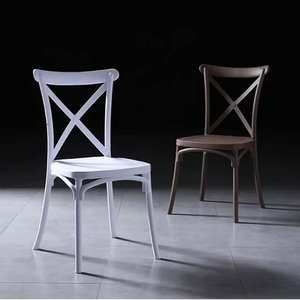 Chaises de salle à manger en plastique empilables de style français pour l'intérieur et l'extérieur, avec dossier croisé en X, pour restaurants et hôtels - Product Image 1
