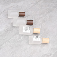 Bouteille en verre de parfum avec couvercle en bois rechargeable de 30ml Conteneur de cosmétiques Botol rond de parfum mat givré avec atomiseur