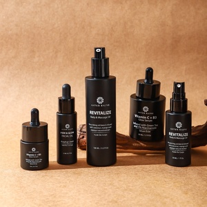 Bộ sản phẩm chăm sóc da CHUM Fancy, bao gồm lọ kem dưỡng mặt thủy tinh đen, chai sữa dưỡng thể có vòi bơm và ống nhỏ giọt. - Product Image 5