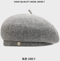 Chine Xinxing nouveau Style minimaliste à large bord 100% laine à la mode polyvalent métal Logo artiste casquette béret chaud pour une utilisation en extérieur