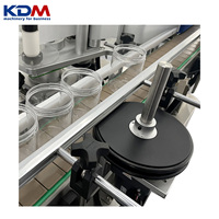 Machine d'étiquetage automatique KDM-AL150 pour bouteilles, bocaux, canettes et contenants cylindriques
