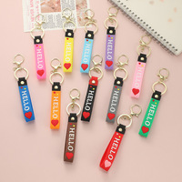 Porte-clés en caoutchouc souple PVC en forme de cœur, avec cordon en cuir, pour sacs, pendentifs décoratifs, mignons et très demandés