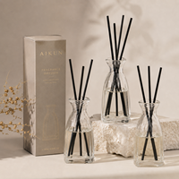 Ensemble diffuseur de parfum en verre personnalisé Aikun, étiquette privée, diffuseur de parfum en rotin pour la maison, coffret cadeau pour la décoration de la salle d'hôtel ou de spa