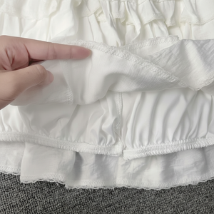 Conjunto de 2 piezas de punto a la moda para mujer 2025 cárdigan de manga larga con cordones Top de cuello cuadrado y minifalda con volantes fábrica OEM al por mayor - Product Image 1
