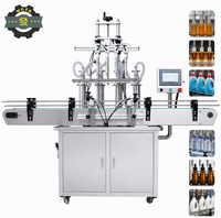 Machine de remplissage liquide entièrement automatique à 4 buses de haute précision pour détergent, huile de cuisson, huile moteur