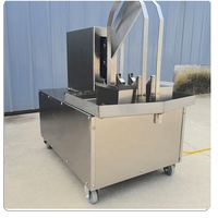 Machine à découper la noix de coco à haute efficacité, machine automatique d'ouverture de noix de coco pour la noix de coco fraîche