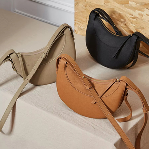 Bolso de media luna de cuero de primera capa para mujer elegante 2025 diseño de nicho bandolera sillín axila bolso elegante - Product Image 1
