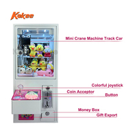 Mini poupée Grabber grue Machine pièce jeton opération pour cadeau Capsule peluche jouet distributeur automatique