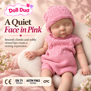 ตุ๊กตาซิลิโคน DollDuo ขนาด 13 นิ้ว แบบสั่งทำพิเศษ ตุ๊กตาเด็กแรกเกิดหลับตา ชุดหมวกไหมพรมสีชมพู วาดลายด้วยมือ ของเล่นนุ่มนิ่ม ของขวัญคริสต์มาส - Product Image 1
