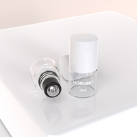 Vente en gros de flacons en verre transparent pour huiles essentielles et parfums, 1 ml et 2 ml, avec bille en acier pour emballage cosmétique
