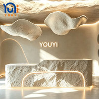 Comptoir de réception de spa moderne incurvé blanc, entièrement fait main et personnalisé, avec éclairage LED, respectueux de l'environnement, pour salon de beauté, magasin de détail, hôtel
