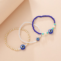 Bracelet ethnique fait main en perles de riz, œil de diable multicolore en résine tressée, bracelet œil bleu, bijoux bohèmes