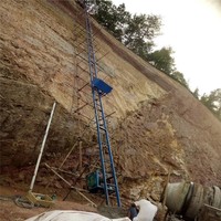 Élévateur d'échelle de cargaison électrique sûr personnalisé de 0 à 500m 500Kg 1 tonnes pour portes et fenêtres Élévateur d'échelle en ciment pour travaux d'escalade
