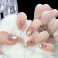 Vente en gros de faux ongles en acrylique faits à la main, courts, en forme d'amande, avec fleurs 3D, pré-conçus, logo personnalisable