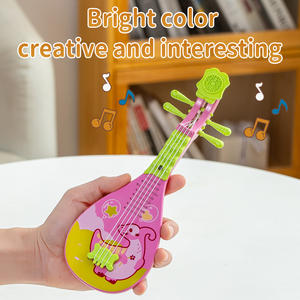 Instrument de musique de simulation en plastique pour <span class=keywords><strong>enfants</strong></span>, mini jouet à quatre cordes pour les <span class=keywords><strong>enfants</strong></span> de 3 à 7 ans, guitare musicale pouvant contenir des bonbons - Product Image 4