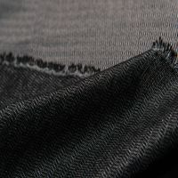 Tissu d'interligne en polyester fusible Trict tricoté Oeko Warp avec une excellente adhérence pour les applications de couture
