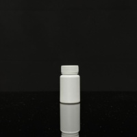 Pilulier en plastique blanc personnalisable de 60ml 75ml 100ml 120ml avec bouchon à vis à l'épreuve des enfants bouteille de capsule HDPE pour emballage liquide
