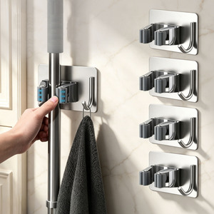 Support mural adhésif en acier inoxydable <span class=keywords><strong>de</strong></span> haute qualité pour balais et serpillères, organisateur d'outils <span class=keywords><strong>de</strong></span> nettoyage, pince <span class=keywords><strong>de</strong></span> rangement pour balais et râteaux - Product Image 2