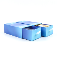 Tiroir d'emballage cosmétique de parfum de conceptions de stratification de Matt de Noël bleu personnalisé écologique glissant la boîte de papier