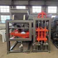 Machine à blocs creux hydraulique entièrement automatique QT4-15 de haute qualité et à production élevée, ligne de moulage de briques en béton et en ciment