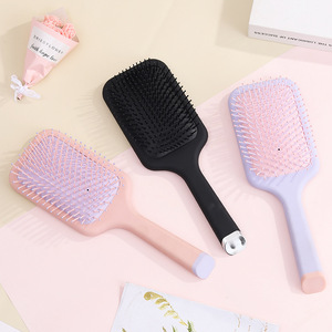 Brosse à cheveux coussinée noire mate à poils en nylon, forme oblongue, pour cheveux raides et massage capillaire - Product Image 2