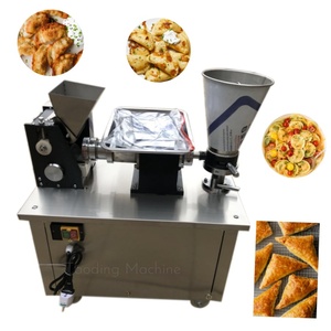 Nouveauté 	 Machine <span class=keywords><strong>à</strong></span> fabriquer <span class=keywords><strong>des</strong></span> raviolis, machine <span class=keywords><strong>à</strong></span> plier les samosas, modèle italien 	 Machine automatique <span class=keywords><strong>à</strong></span> tartelettes et <span class=keywords><strong>à</strong></span> boulettes - Product Image 4