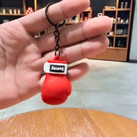 Porte-clés Gant de Boxe en Caoutchouc, Pendentif de Combat Rouge, Accessoire Indispensable pour les Fans de Sanda et de Boxe, Petit Article Indispensable
