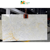 Dalle de marbre blanc de l'âge glacial naturel, marbre onyx blanc, mur rétroéclairé, table à manger photoélectrique, îlot de cuisine, crédence