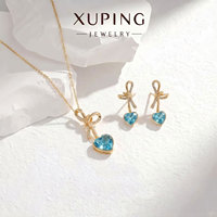 Ensemble de bijoux XUPING en gros : Collier et boucles d'oreilles en cristal synthétique, plaqué or 18 carats, pour femme, tendance et élégant