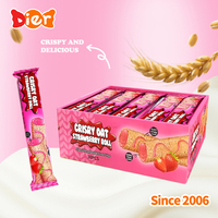 Vente en gros de bonbons personnalisés Marque distributeur Biscuits croustillants halal Rouleau soufflé au chocolat et aux fraises Sauce savoureuse Collation sucrée