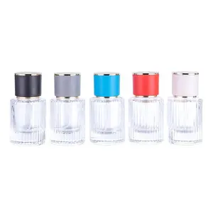 Offre Spéciale vente en gros 30ml bouteille de parfum en verre de luxe dépouillé de cylindre avec des bouchons colorés