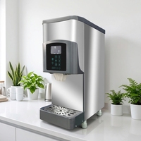 La machine à glace de comptoir à usage domestique commerciale avec distributeur automatique produit des glaçons à l'aide de composants de noyau de pompe de compresseur