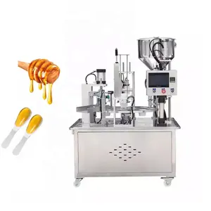 Automatic rotary quantitative plastic cup honey spoon filling sealing machine packing machine