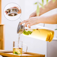 Grande carafe en verre borosilicate résistant à la chaleur, avec couvercle en acier inoxydable et poignée en verre, 1,6 L, moderne, pour jus, thé, bière, boissons