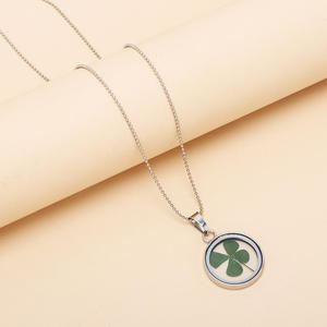 <span class=keywords><strong>2025</strong></span> Новая мода сушеные листья счастливый 4-листовой Клевер круглый стеклянный медальон кулон ожерелье - Product Image 2
