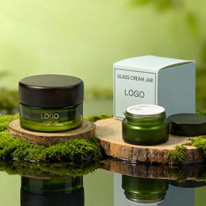 Envase cosmético redondo de lujo Premium, Mini Crema para Ojos vacía recargable, crema facial, tarro de vidrio verde con tapas negras - Product Image 1