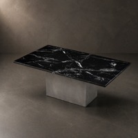 Table basse rectangulaire moderne en pierre avec base géométrique finition ciment, personnalisable pour projets hôteliers et de villas