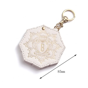Wholesale Fashion White Flower Shape Hot Stamping PU Leather Keychain Portable Vanity Mirror - Product Image 6