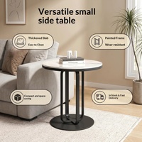 Table basse compacte de luxe léger, design moderne minimaliste avec structure métallique et plateau en pierre veinée, multifonctionnelle pour salon