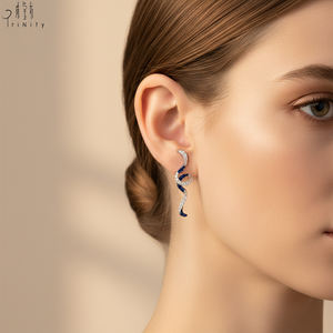 Boucles d'oreilles clous populaires en or blanc massif 18 carats avec diamants naturels et saphirs, série lignes courbes, vente en gros - Product Image 2