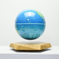 Globe Lumineux Flottant Créatif d'Art Moderne en Gros, Ornement de Nuit avec Base Polygonale Jaune en ABS et Lévitation Magnétique