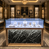 Vitrine élégante en aluminium pour bijoux avec éclairage LED pour boutique de luxe, magasin de détail, design d'intérieur de salle d'exposition