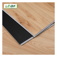 Revêtement de sol composite pierre-plastique (SPC) à clipser, imitation bois, durable et économique, facile à installer, pour salons
