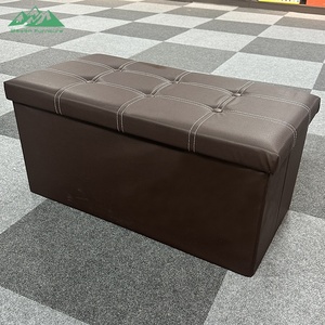 Banc ottoman pliable compact et peu encombrant en cuir noir avec rangement caché - Product Image 2